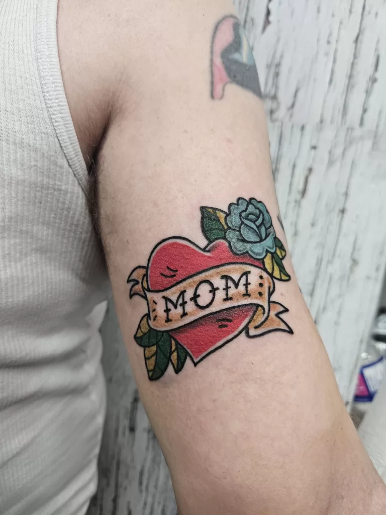 Old school mom tattoo with heart and roses.