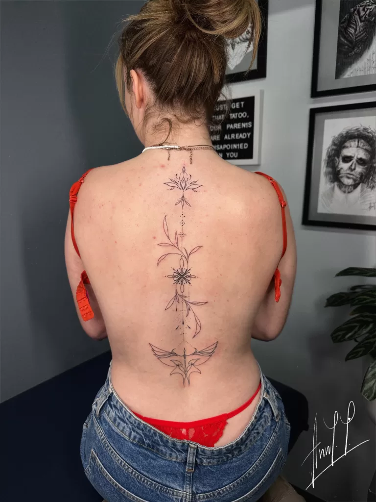 Fineline spine tattoo 