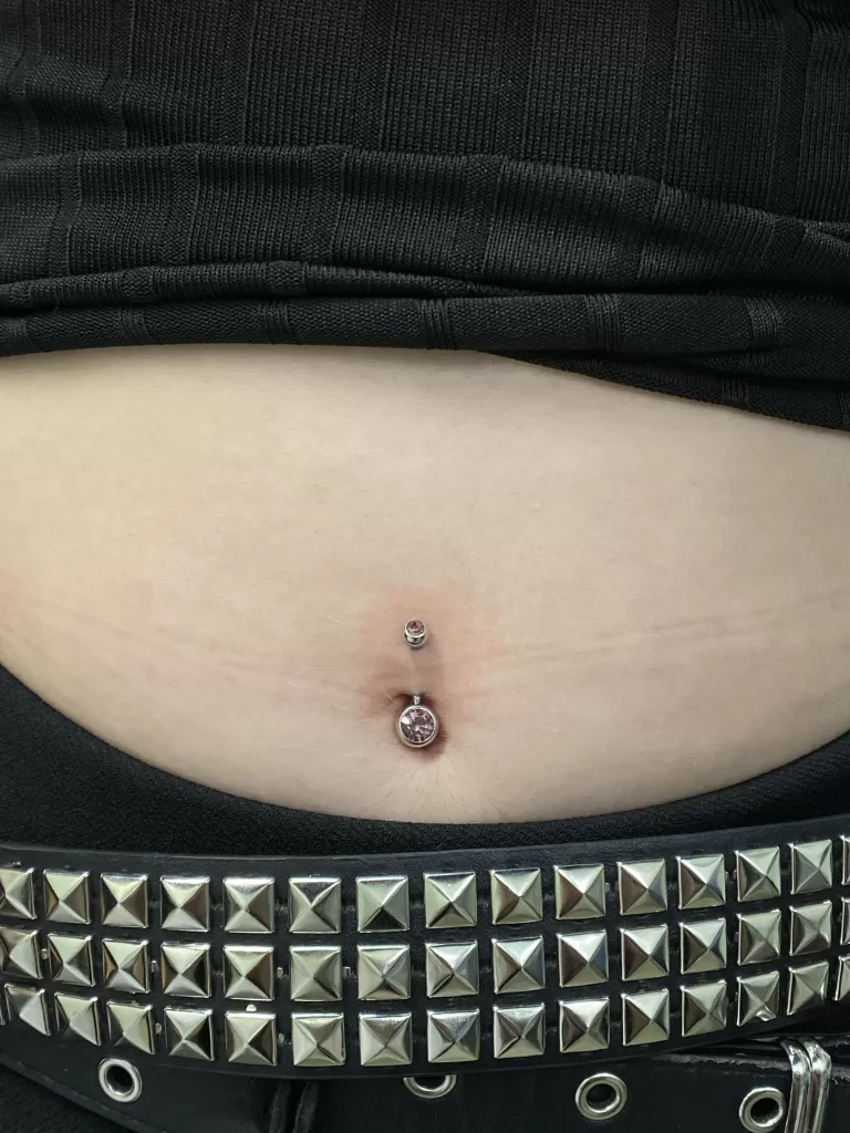 Cute pink gem navel piercing