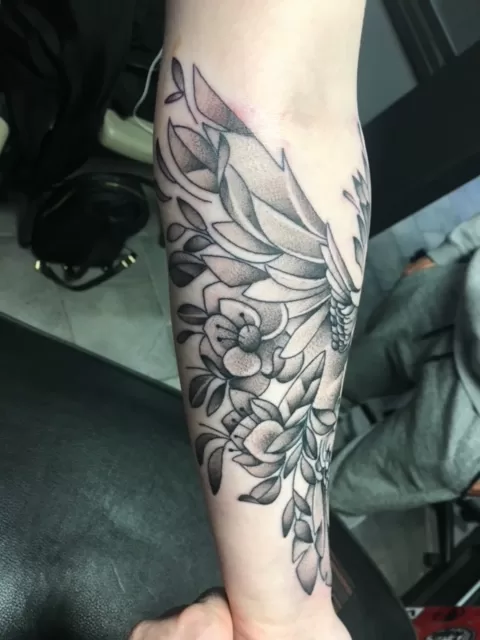 bird with flowers black and grey tattoo