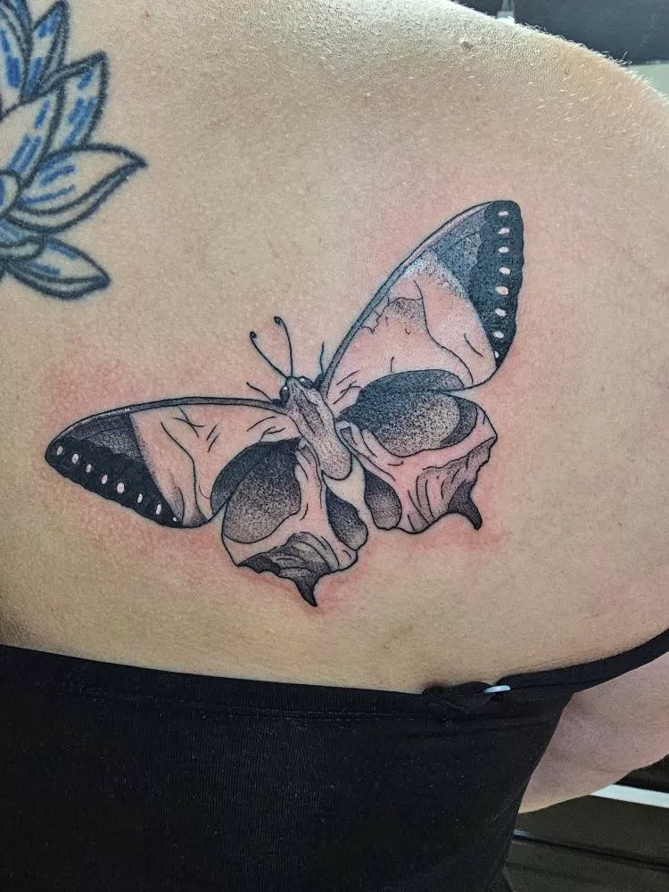 skull butterfly tattoo