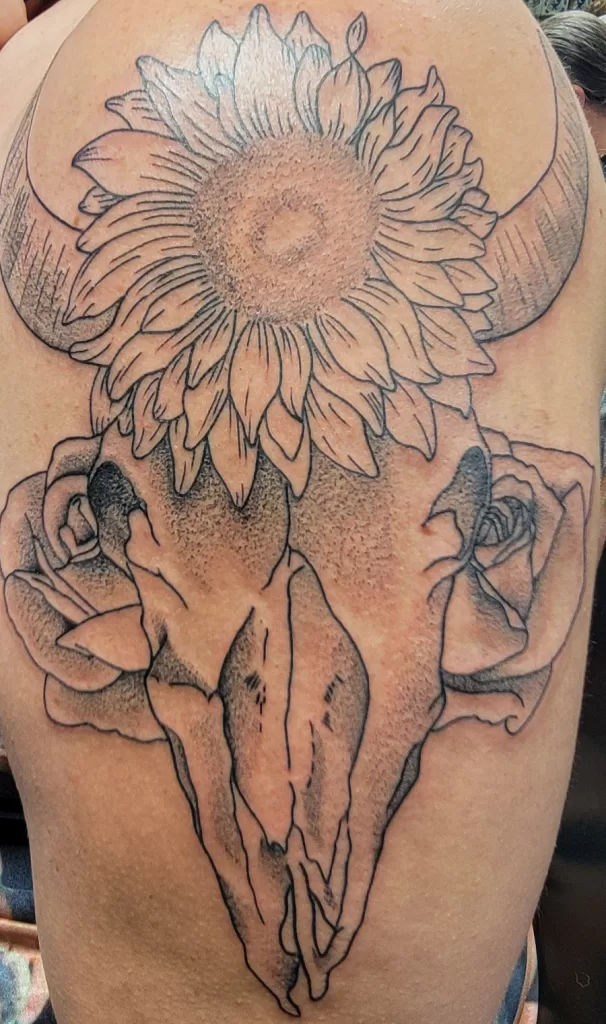 flower and skull tattoo